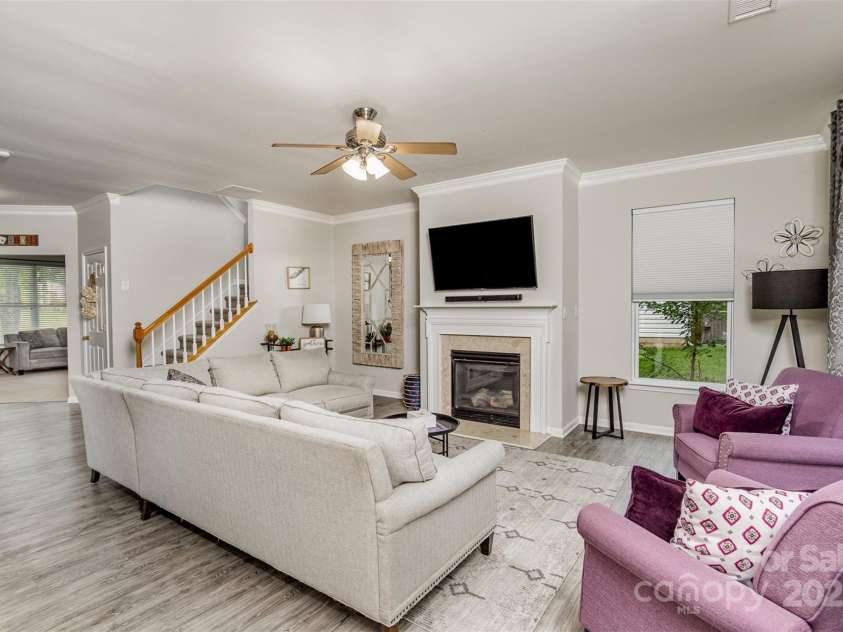 3009 Early Rise Avenue, Indian Trail, NC 28079.  MLS# CAR4241986, YatesRealty ID 26287. Family Room with Fireplace