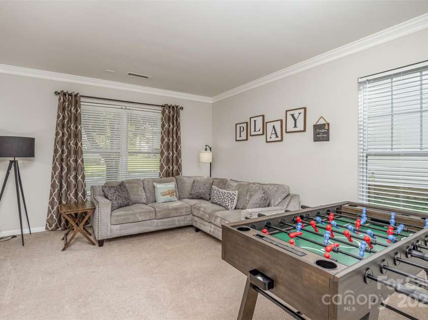 3009 Early Rise Avenue, Indian Trail, NC 28079.  MLS# CAR4241986, YatesRealty ID 26287. Formal Living/Game Room