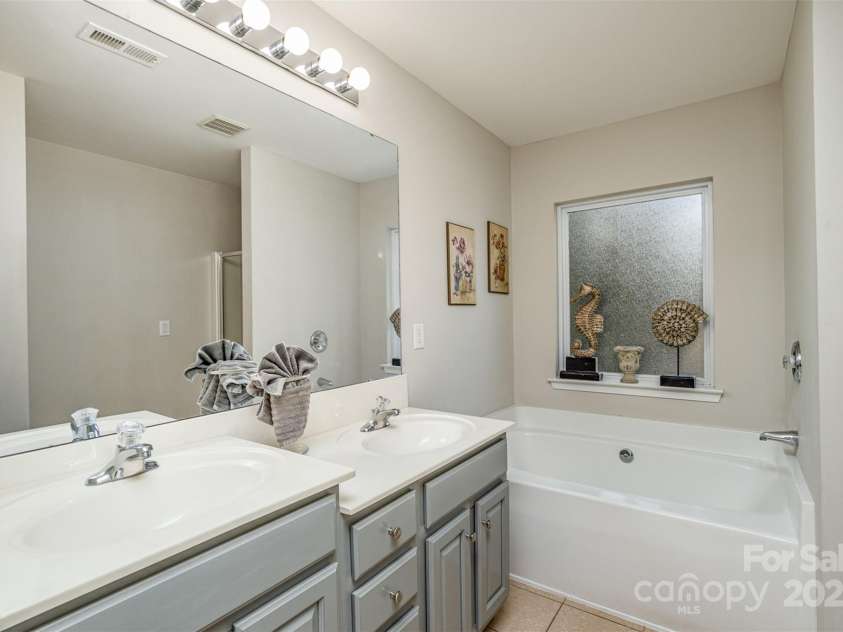 3009 Early Rise Avenue, Indian Trail, NC 28079.  MLS# CAR4241986, YatesRealty ID 26287. Primary Bathroom