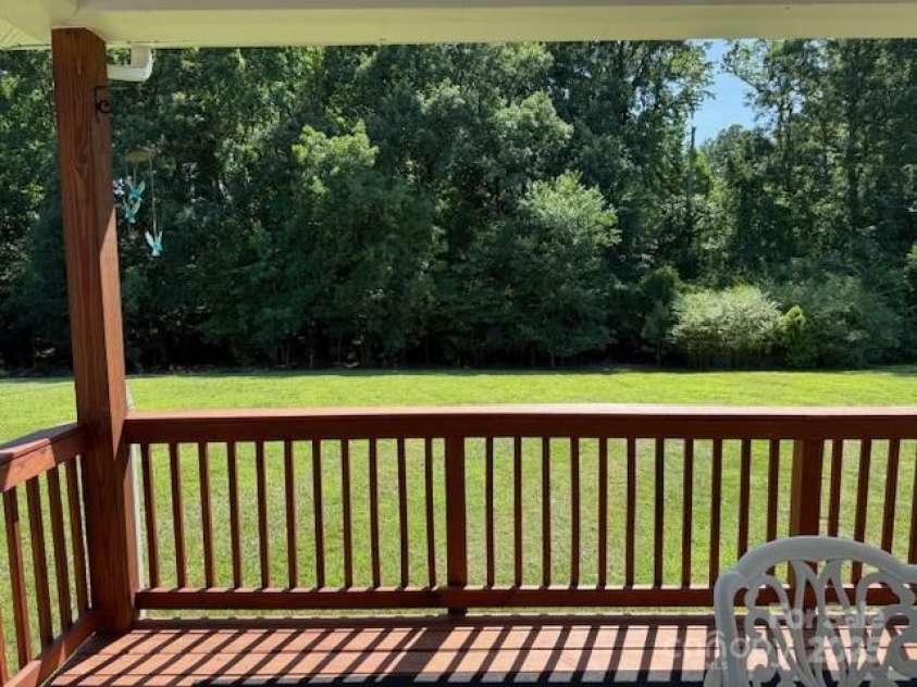 231 Glenwood Drive, Oakboro, NC 28129.  MLS# CAR4273130, YatesRealty ID 26289. Back Deck