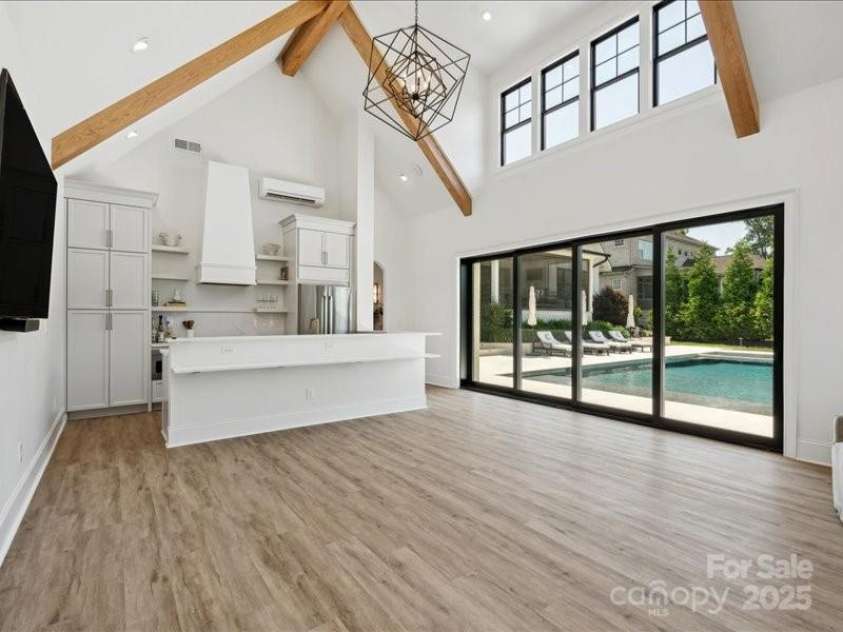 4208 Antioch Church Road, Weddington, NC 28104.  MLS# CAR4282332, YatesRealty ID 26291. Pool House Kitchen & Living Room