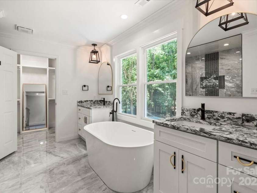 9830 Spring Harvest Drive, Mint Hill, NC 28227.  MLS# CAR4326082, YatesRealty ID 26292. Primary bathroom