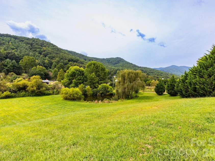 18 Hoye Lane, Candler, NC 28715.  MLS# CAR4345280, YatesRealty ID 26294. Front yard view