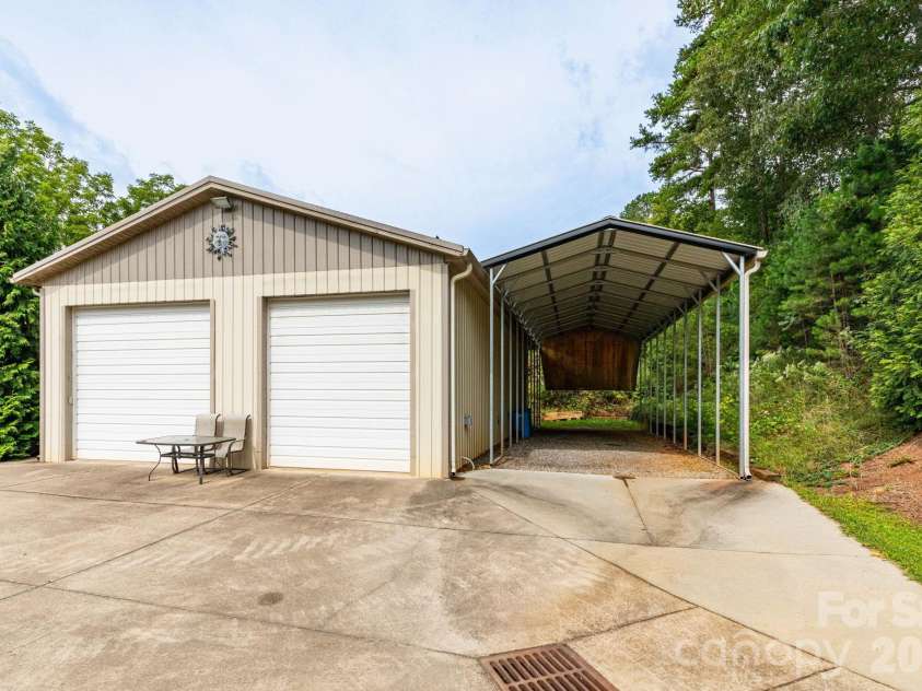 18 Hoye Lane, Candler, NC 28715.  MLS# CAR4345280, YatesRealty ID 26294. Separate garage with RV Parking