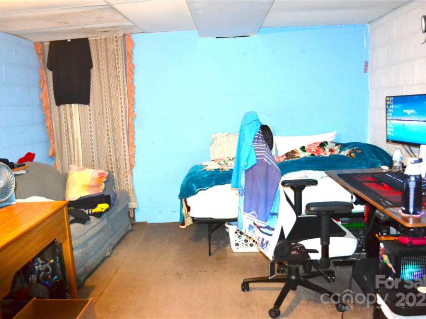 405 Wesley Heights Drive, Albemarle, NC 28001.  MLS# CAR4272842, YatesRealty ID 263. Basement bedroom