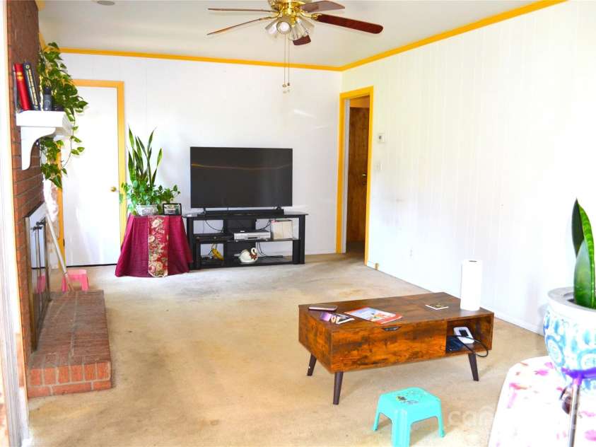 405 Wesley Heights Drive, Albemarle, NC 28001.  MLS# CAR4272842, YatesRealty ID 263. Family room