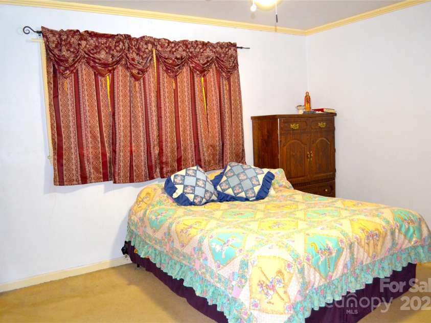 405 Wesley Heights Drive, Albemarle, NC 28001.  MLS# CAR4272842, YatesRealty ID 263. Master Bedroom