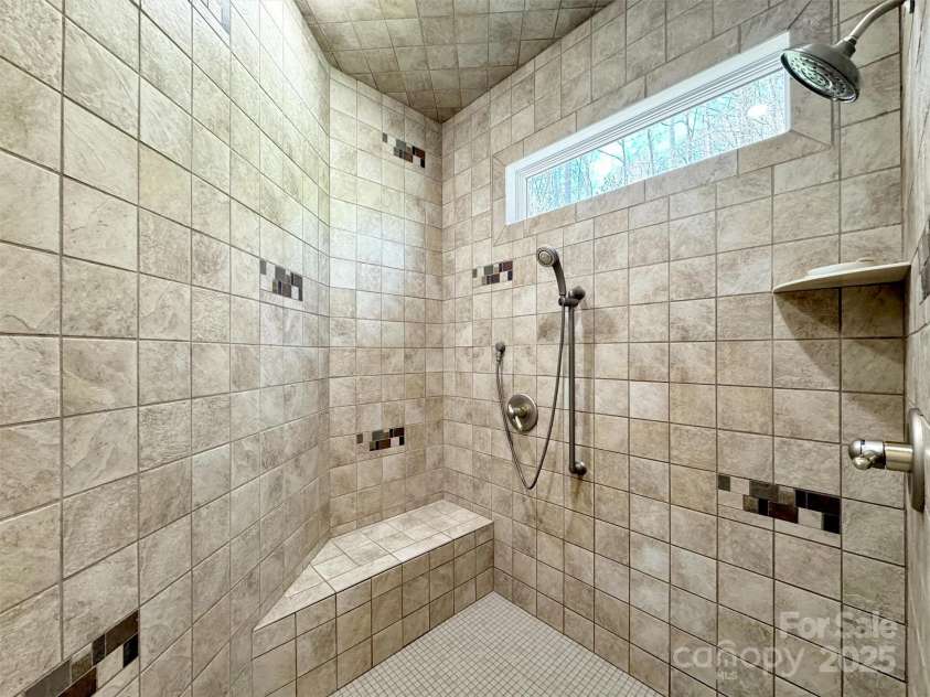 78 Aster Lane, Waynesville, NC 28786.  MLS# CAR4240828, YatesRealty ID 2630. Large Step-In Shower