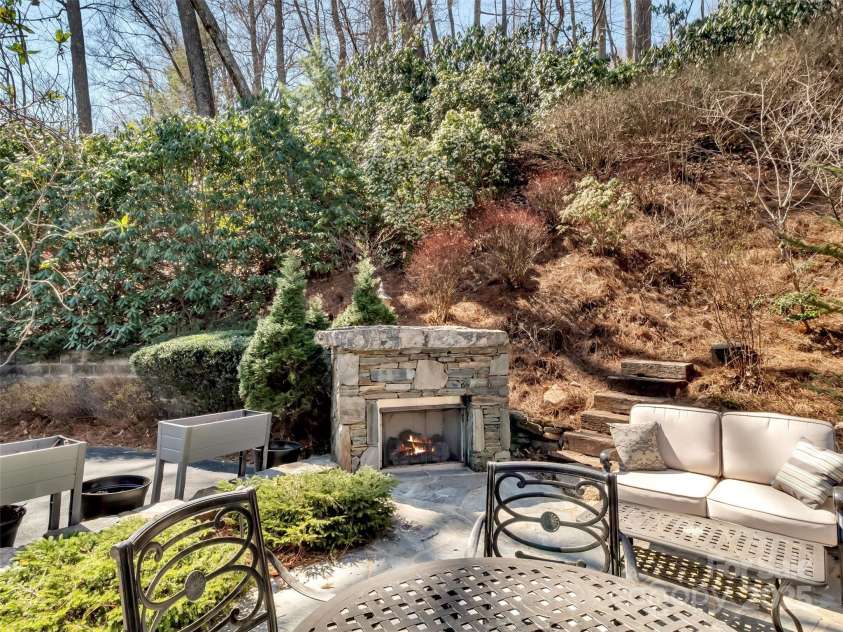 78 Aster Lane, Waynesville, NC 28786.  MLS# CAR4240828, YatesRealty ID 2630. Relax by the Fireplace