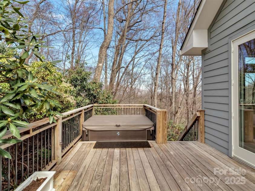 78 Aster Lane, Waynesville, NC 28786.  MLS# CAR4240828, YatesRealty ID 2630. Unwind in the Hot Tub