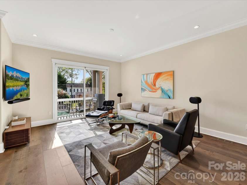 3074 Selwyn Avenue, Charlotte, NC 28209.  MLS# CAR4366300, YatesRealty ID 26301. Great room with access to balcony