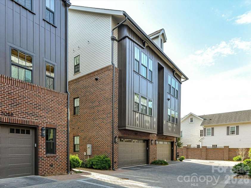 3074 Selwyn Avenue, Charlotte, NC 28209.  MLS# CAR4366300, YatesRealty ID 26301. Side by side garage with epoxy floors and wall slat system for storage