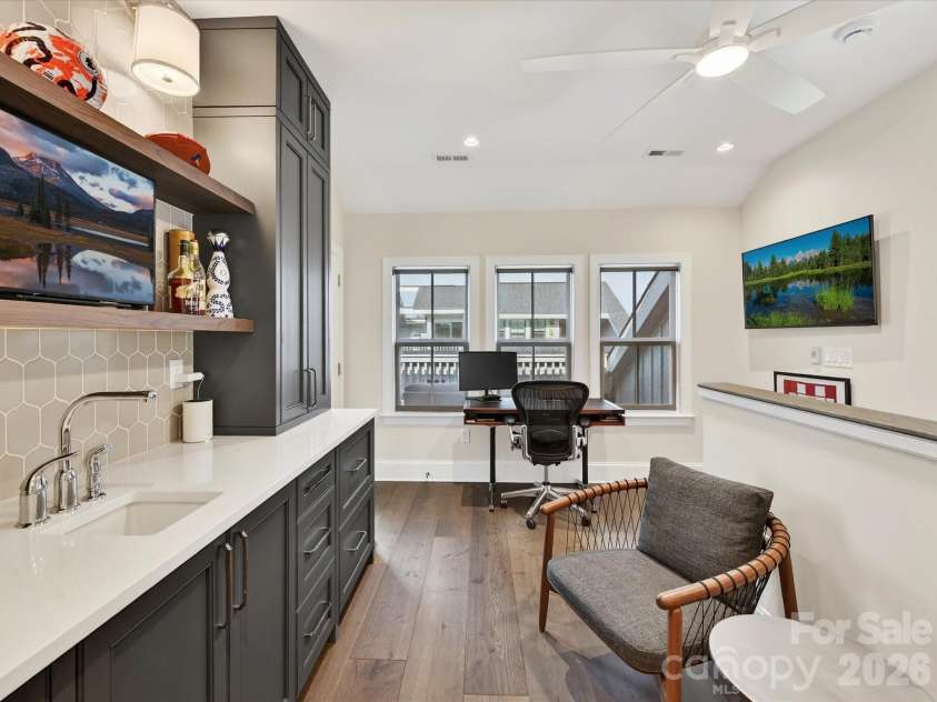 3074 Selwyn Avenue, Charlotte, NC 28209.  MLS# CAR4366300, YatesRealty ID 26301. Upper level bar/entertainment/office
