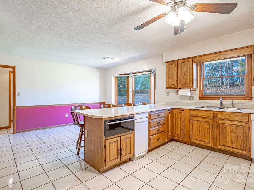35 Tree Top Drive, Arden, NC 28704.  MLS# CAR4237850, YatesRealty ID 26306. Kitchen with pantry