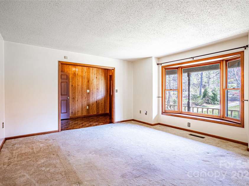 35 Tree Top Drive, Arden, NC 28704.  MLS# CAR4237850, YatesRealty ID 26306. Living Room off Foyer