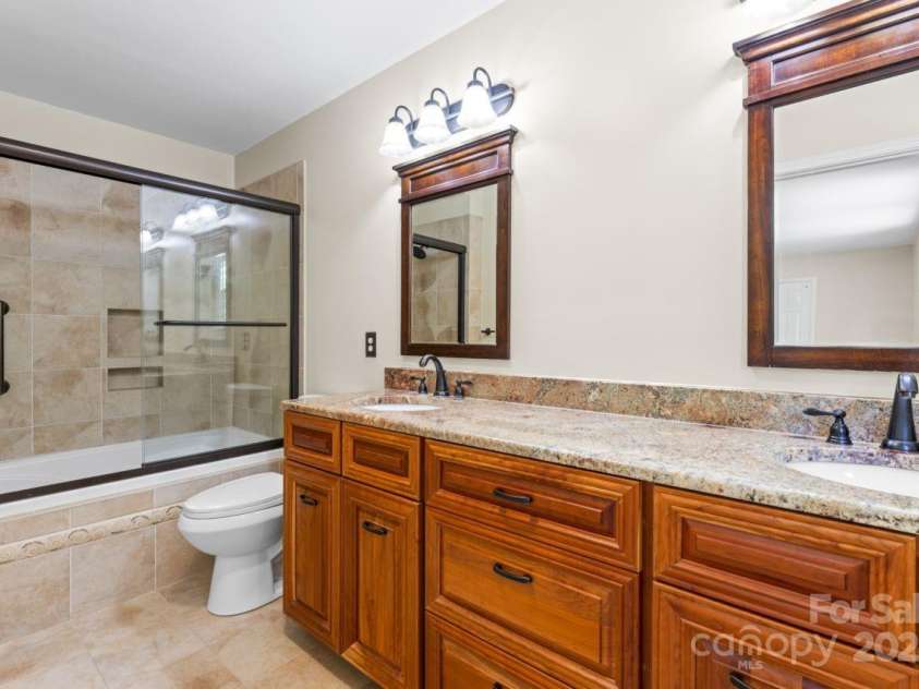 8007 Caldwell Road, Harrisburg, NC 28075.  MLS# CAR4268638, YatesRealty ID 26309. Primary Bathroom