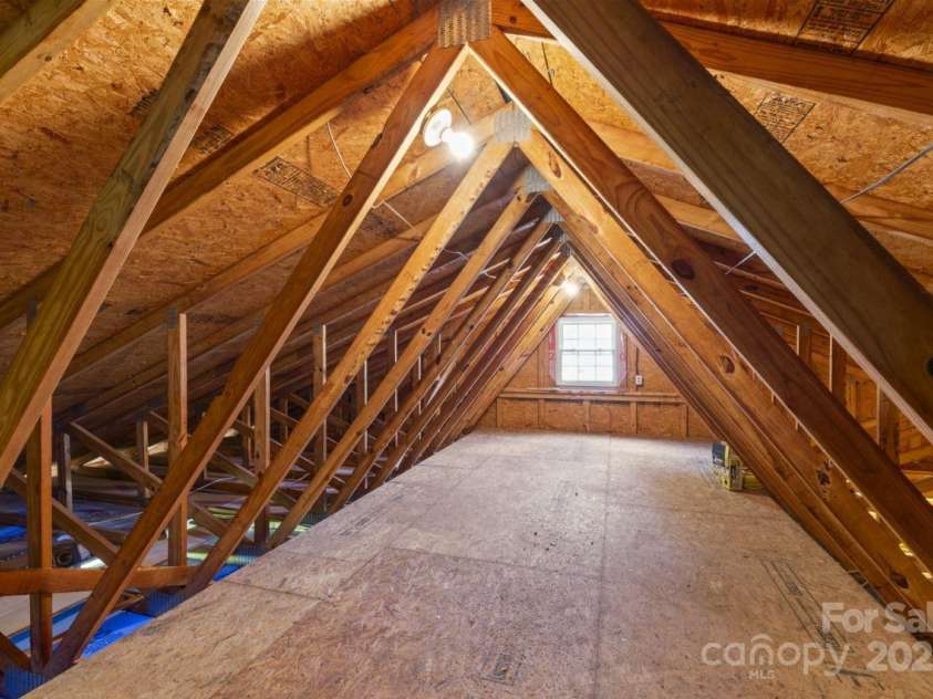 8007 Caldwell Road, Harrisburg, NC 28075.  MLS# CAR4268638, YatesRealty ID 26309. Storage area above Detached Garage