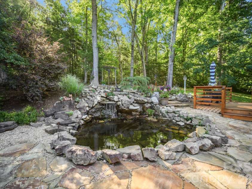 9701 Deer Run Road, Waxhaw, NC 28173.  MLS# CAR4382004, YatesRealty ID 26310. Backyard water feature