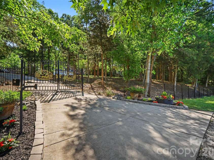 9701 Deer Run Road, Waxhaw, NC 28173.  MLS# CAR4382004, YatesRealty ID 26310. Private front gate entrance