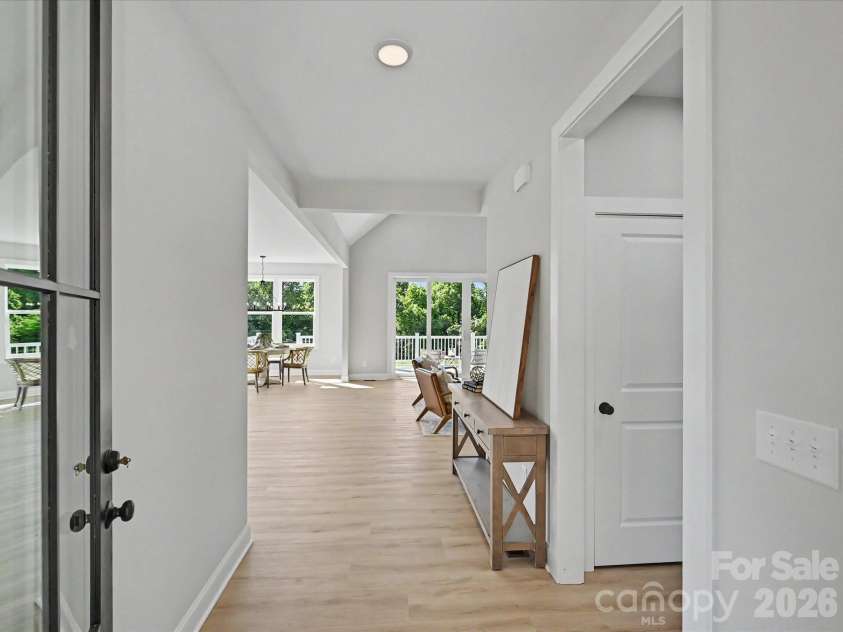 163 Lone Pine Road, Statesville, NC 28625.  MLS# CAR4383652, YatesRealty ID 26311. Bright and welcoming entryway opens into an airy open-concept living space featuring soaring ceilings, abundant natural light, and seamless indoor-outdoor flow.