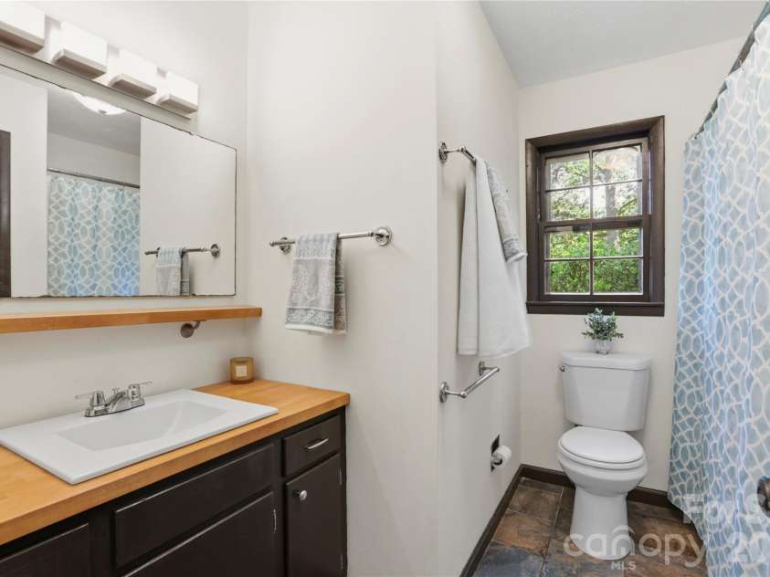 38 Nixon Terrace, Asheville, NC 28805.  MLS# CAR4385121, YatesRealty ID 26316. Virtually staged lower level bonus room
