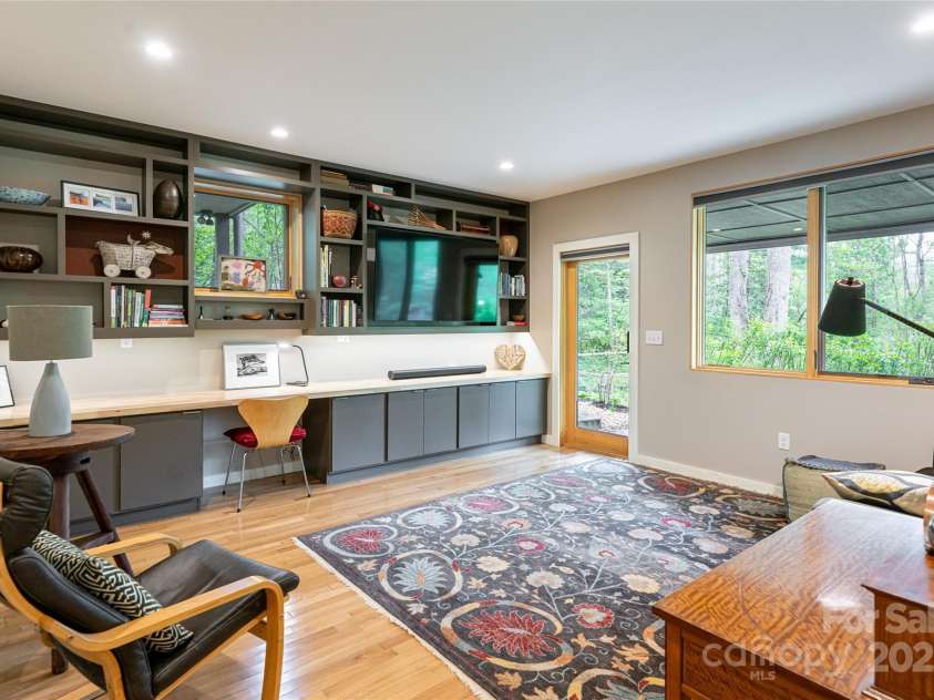 2057 Riceville Road, Asheville, NC 28805.  MLS# CAR4252672, YatesRealty ID 26320. Lower family room