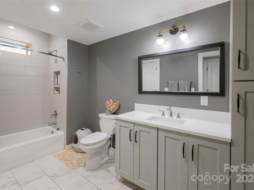 2057 Riceville Road, Asheville, NC 28805.  MLS# CAR4252672, YatesRealty ID 26320. Lower full bathroom