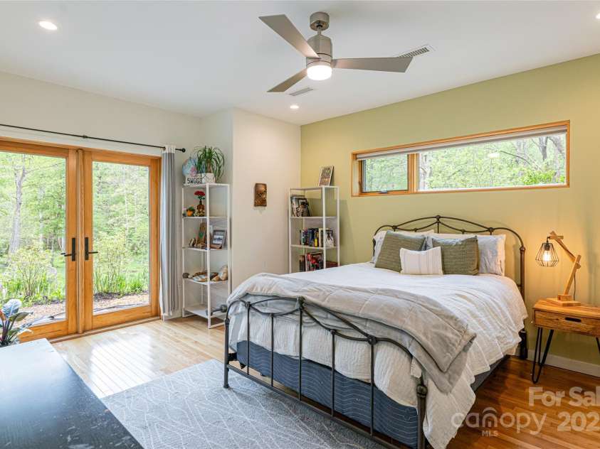 2057 Riceville Road, Asheville, NC 28805.  MLS# CAR4252672, YatesRealty ID 26320. Lower guest bedroom