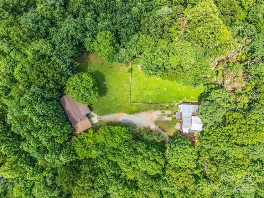 2430 2434 Mountain Page Road, Saluda, NC 28773.  MLS# CAR4276015, YatesRealty ID 26321. 2434 is on the left, 2430 is on the right