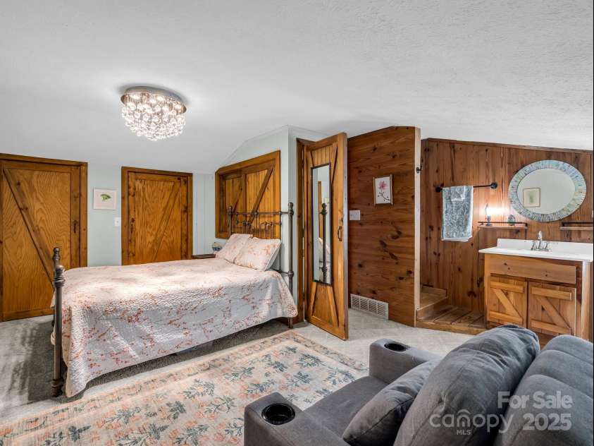 2430 2434 Mountain Page Road, Saluda, NC 28773.  MLS# CAR4276015, YatesRealty ID 26321. Bedroom and half bath on the upper level