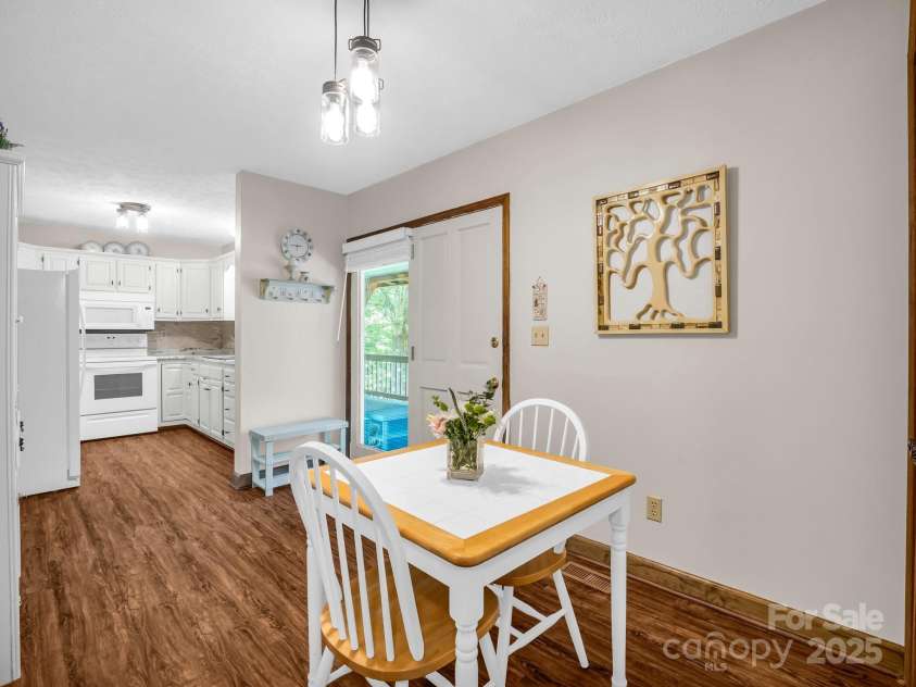 2430 2434 Mountain Page Road, Saluda, NC 28773.  MLS# CAR4276015, YatesRealty ID 26321. Dining area at #2434