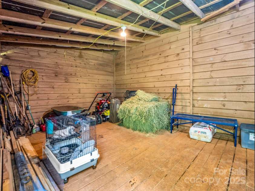 2430 2434 Mountain Page Road, Saluda, NC 28773.  MLS# CAR4276015, YatesRealty ID 26321. Hay and feed storage