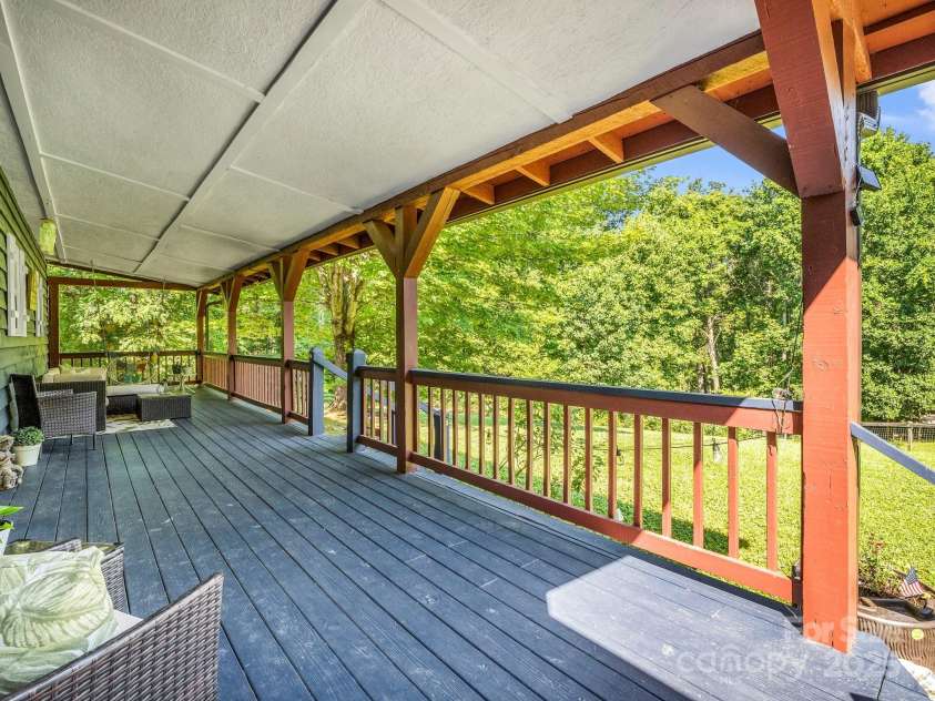 2430 2434 Mountain Page Road, Saluda, NC 28773.  MLS# CAR4276015, YatesRealty ID 26321. Relax on the covered front porch at #2434