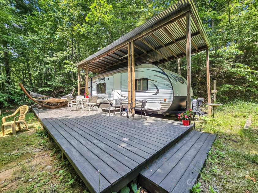 2430 2434 Mountain Page Road, Saluda, NC 28773.  MLS# CAR4276015, YatesRealty ID 26321. RV site with full hook ups