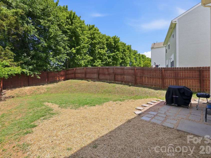 359 Morning Dew Drive, Concord, NC 28025.  MLS# CAR4379729, YatesRealty ID 26324. Private Fully Fenced Yard
