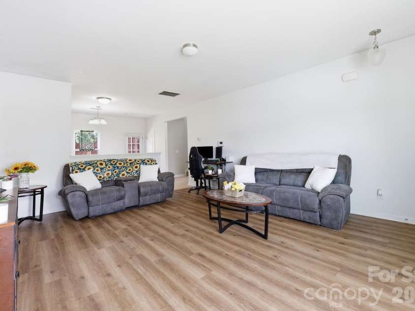 359 Morning Dew Drive, Concord, NC 28025.  MLS# CAR4379729, YatesRealty ID 26324. The open-concept layout creates a bright and invitingatmosphere
