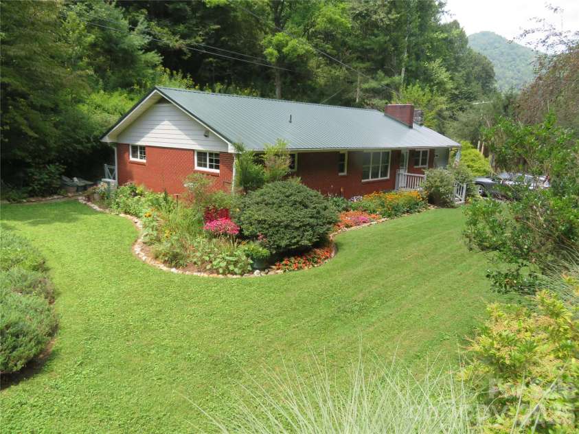 3829 Coxes Creek Road, Burnsville, NC 28714.  MLS# CAR4246043, YatesRealty ID 26331. 10 Acre Property with two versatile workshop buildings
