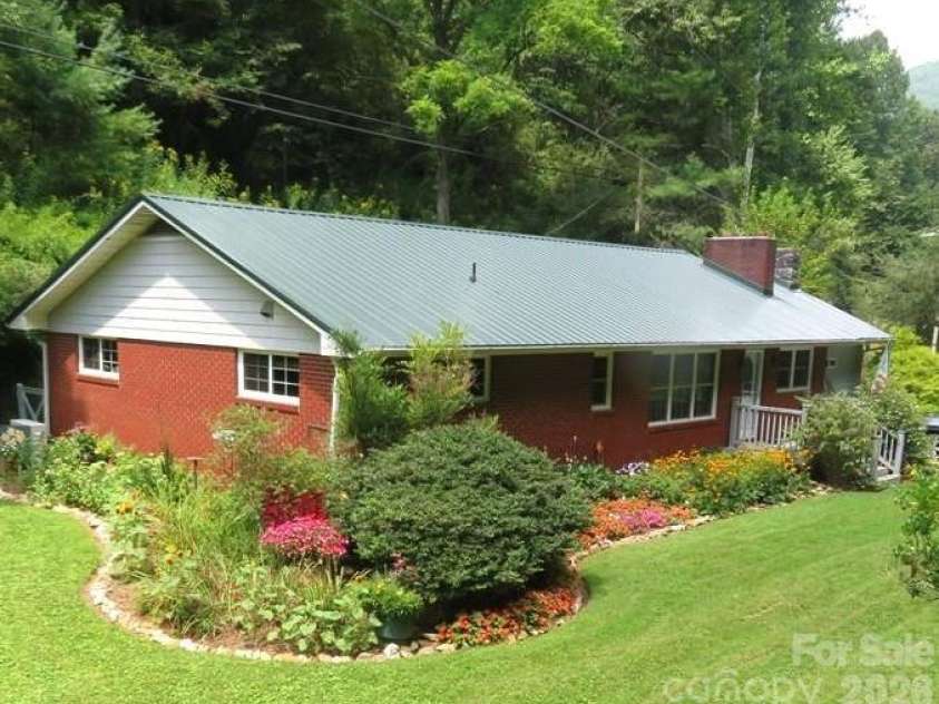 3829 Coxes Creek Road, Burnsville, NC 28714.  MLS# CAR4246043, YatesRealty ID 26331. 10 Acre Property with two versatile workshop buildings