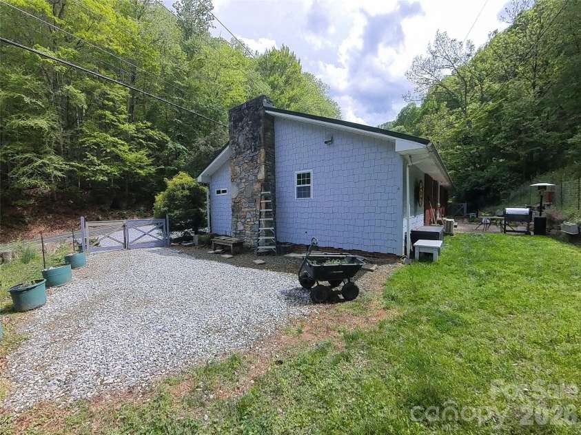 3829 Coxes Creek Road, Burnsville, NC 28714.  MLS# CAR4246043, YatesRealty ID 26331. Fenced Side Area