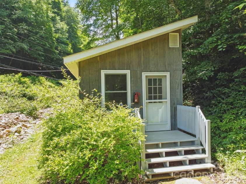 3829 Coxes Creek Road, Burnsville, NC 28714.  MLS# CAR4246043, YatesRealty ID 26331. Heated workshop