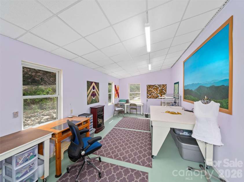 3829 Coxes Creek Road, Burnsville, NC 28714.  MLS# CAR4246043, YatesRealty ID 26331. Inside of workshop 24 x 12
