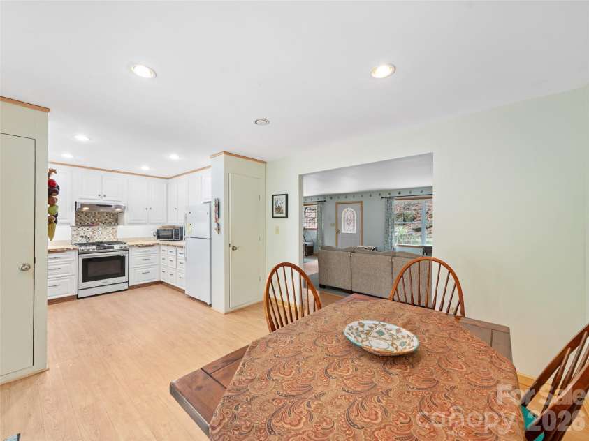 3829 Coxes Creek Road, Burnsville, NC 28714.  MLS# CAR4246043, YatesRealty ID 26331. Open kitchen and dining