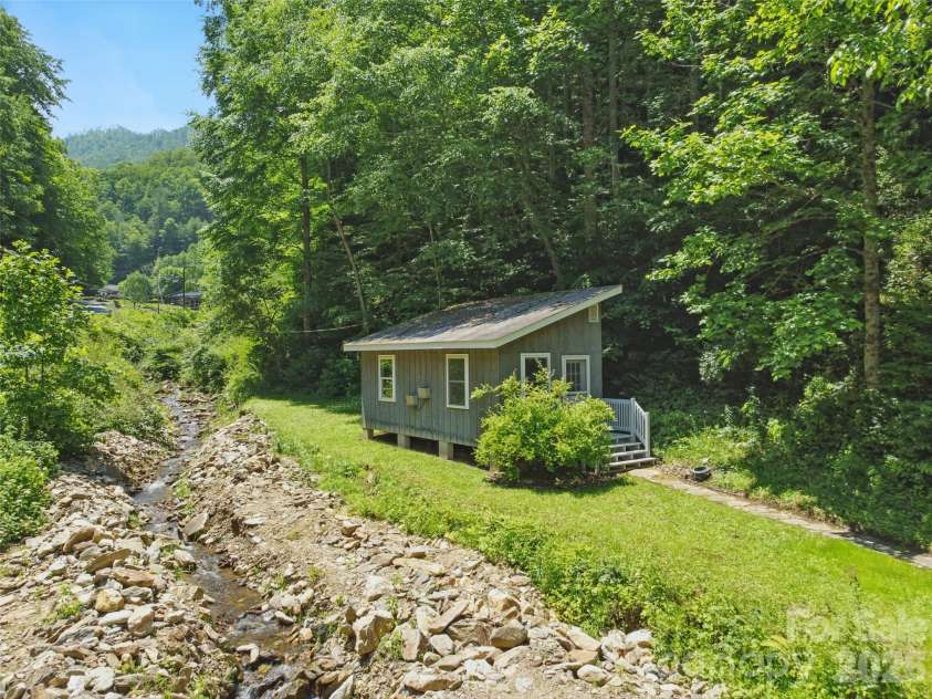 3829 Coxes Creek Road, Burnsville, NC 28714.  MLS# CAR4246043, YatesRealty ID 26331. Outdoor workshop