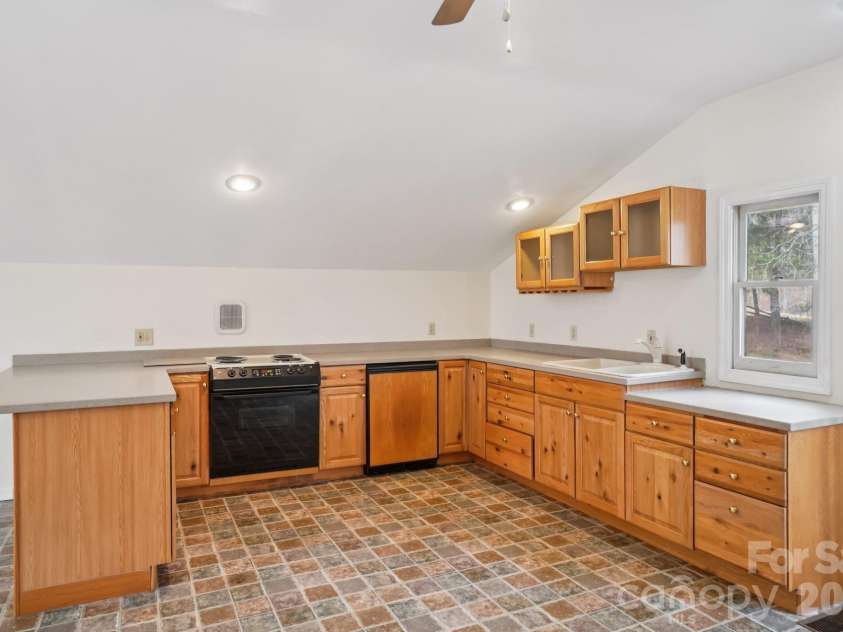 623 Owensby Road, Hendersonville, NC 28792.  MLS# CAR4345844, YatesRealty ID 26332. Apartment kitchen