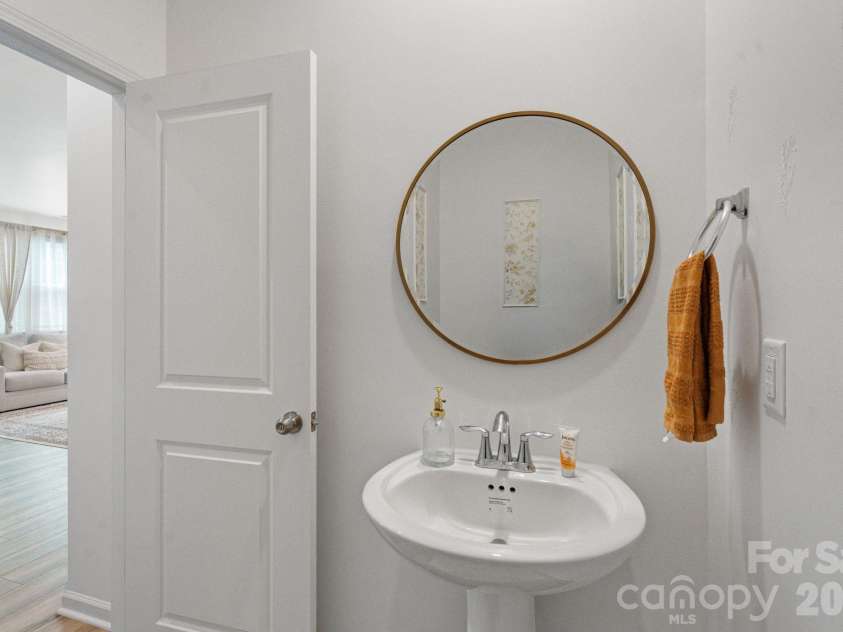 378 Kennerly Center Drive, Mooresville, NC 28115.  MLS# CAR4407885, YatesRealty ID 26333. Half Bath on Main