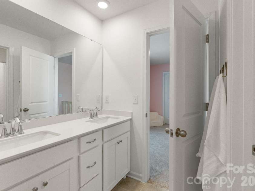 378 Kennerly Center Drive, Mooresville, NC 28115.  MLS# CAR4407885, YatesRealty ID 26333. Shared Bath for Beds 2 & 3