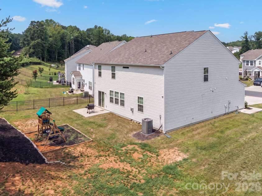 378 Kennerly Center Drive, Mooresville, NC 28115.  MLS# CAR4407885, YatesRealty ID 26333. Usable Backyard
