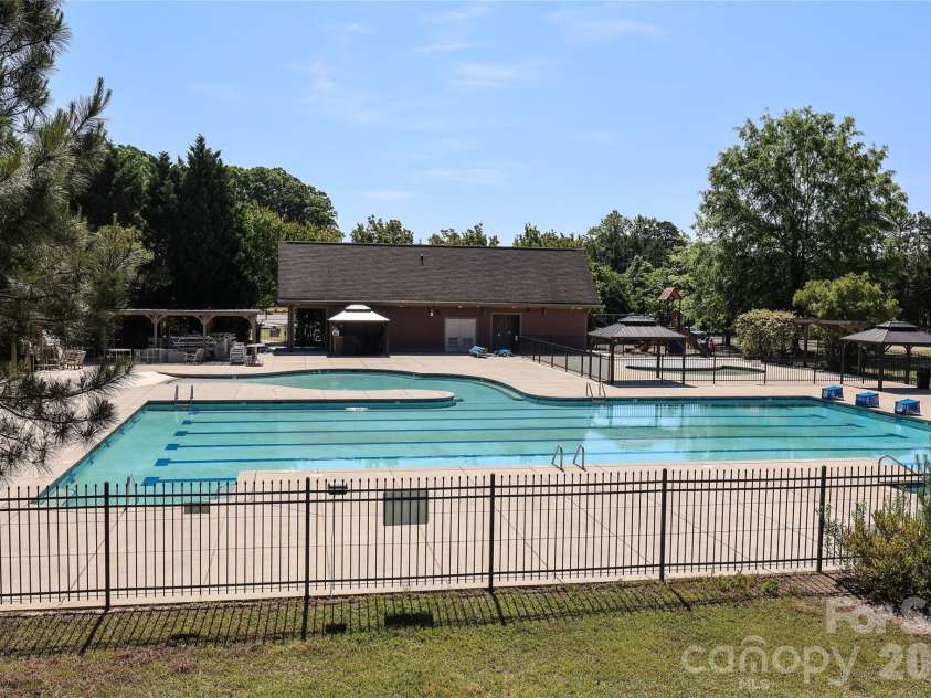 14027 Heron Crest Trace, Charlotte, NC 28278.  MLS# CAR4376291, YatesRealty ID 26335. Community pool with waterslide