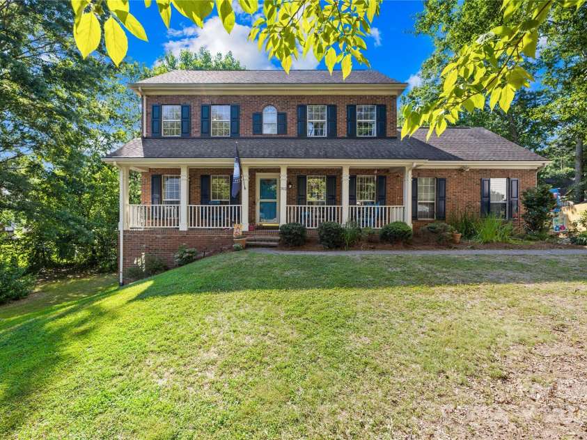 7410 Derby Meadows Court, Charlotte, NC 28216.  MLS# CAR4278987, YatesRealty ID 26335. .46 Acre lot in cul-de-sac with finished basement, side entry 2 car garage