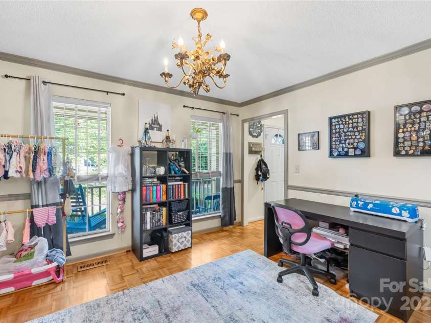 7410 Derby Meadows Court, Charlotte, NC 28216.  MLS# CAR4278987, YatesRealty ID 26335. Dining room with chair railing & parquet floors